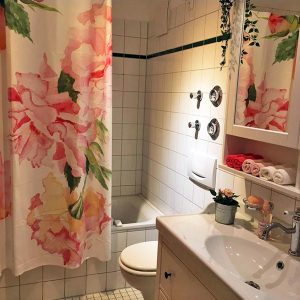 The shower curtain is sooo beautiful and all who have seen it have their mouths open....I think my mom is very excited about the little bathroom I've renovated for her. 5 stars for everything.