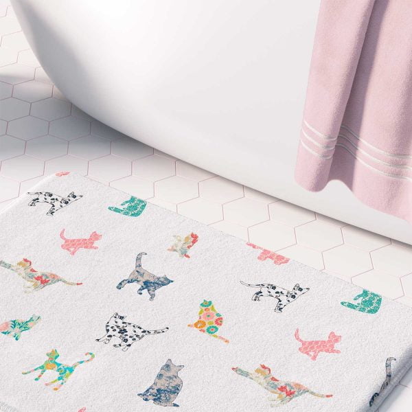 close up comfortable bath mat with cats