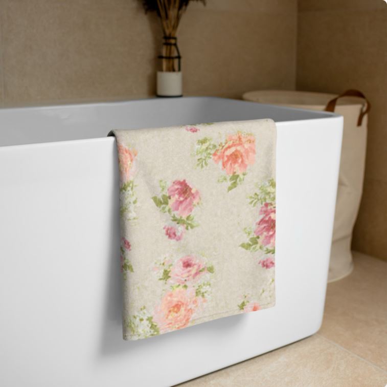 Beige, apricot and pink floral patterned bath towel