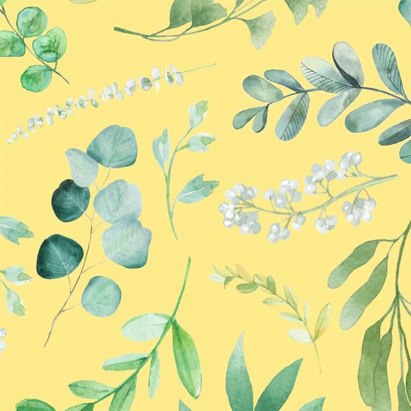 close up of cotton velour yellow floral print on patterned bath towel