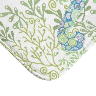 Non-slip microfiber bath mat for kids' bathroom with blue and green seahorse pattern.