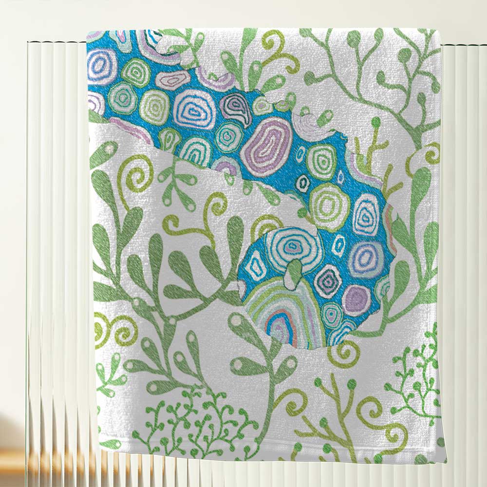 close up of kids bath towel with seahorse print