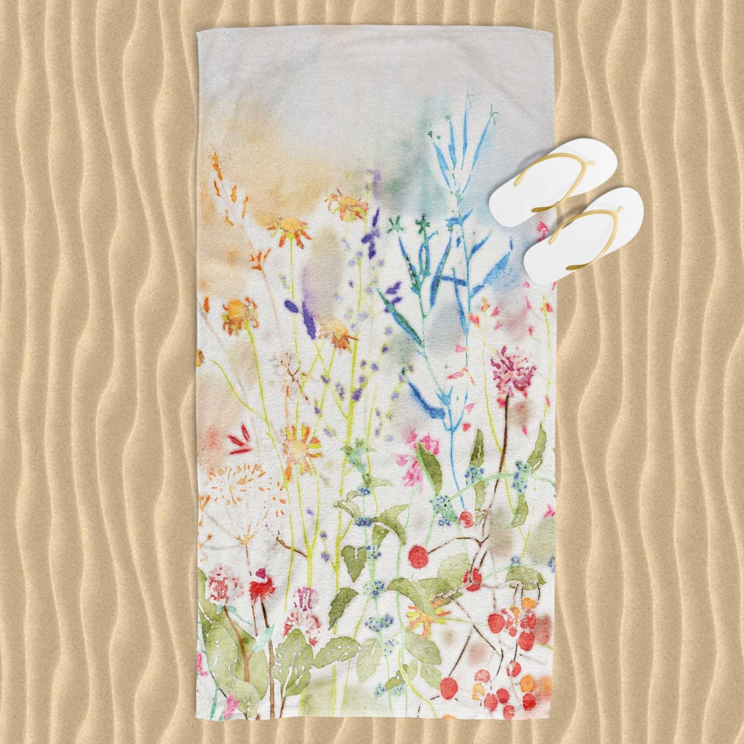 Colorful wildflower floral patterned beach towel with velour front and cotton terry back.