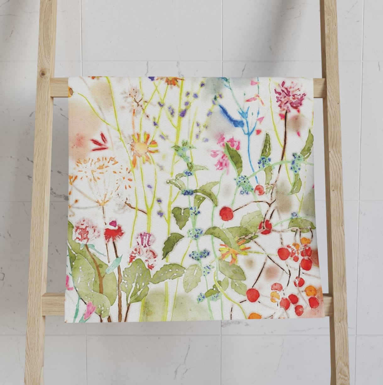 Colorful wildflower floral patterned hand towel with velour front and cotton terry back.