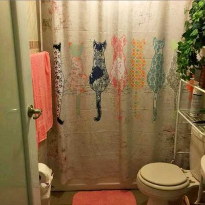 bathroom decor for family bathrooms including a cat shower curtain