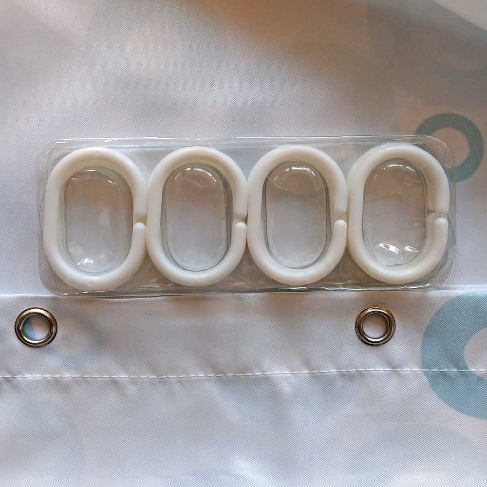 Standard shower curtain showcasing fabric texture, stitching detail, grommets, and includes 12 hooks.