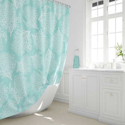 Fabric shower curtain in coastal blue with white coral pattern