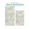 Bath and hand towel set with abstract tropical apricot palm leaves pattern.
