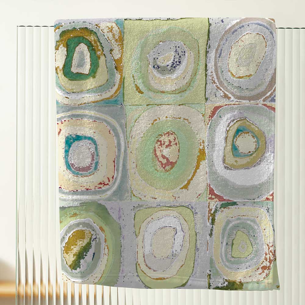 Green, yellow, and gray artistic abstract patterned bath towel.