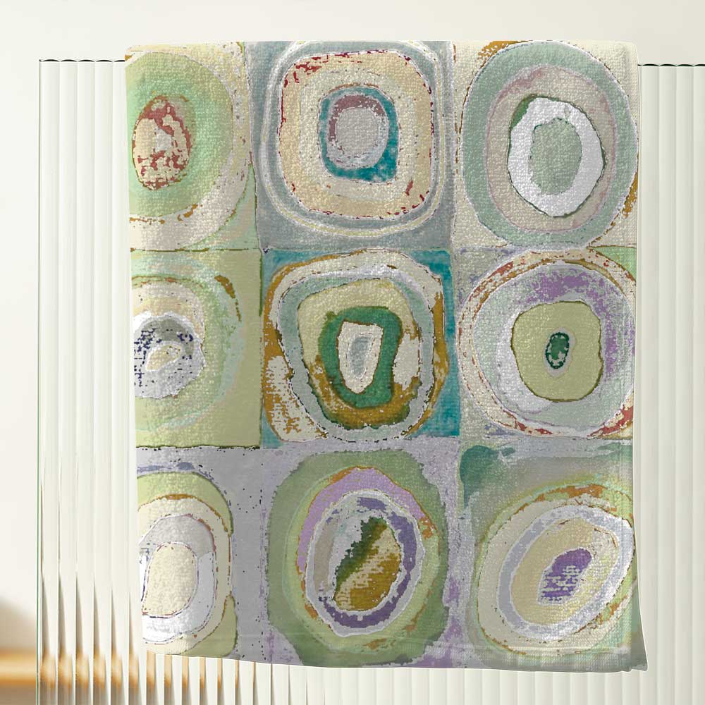 Green, yellow, and gray artistic abstract patterned bath towel.