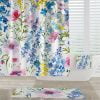 Bright floral fabric shower curtain with lilac, purple, pink, and yellow flowers and strong metal grommets