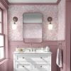 Soft pink watercolor leaves vinyl peel and stick wallpaper in a bathroom, creating a fresh and tranquil atmosphere