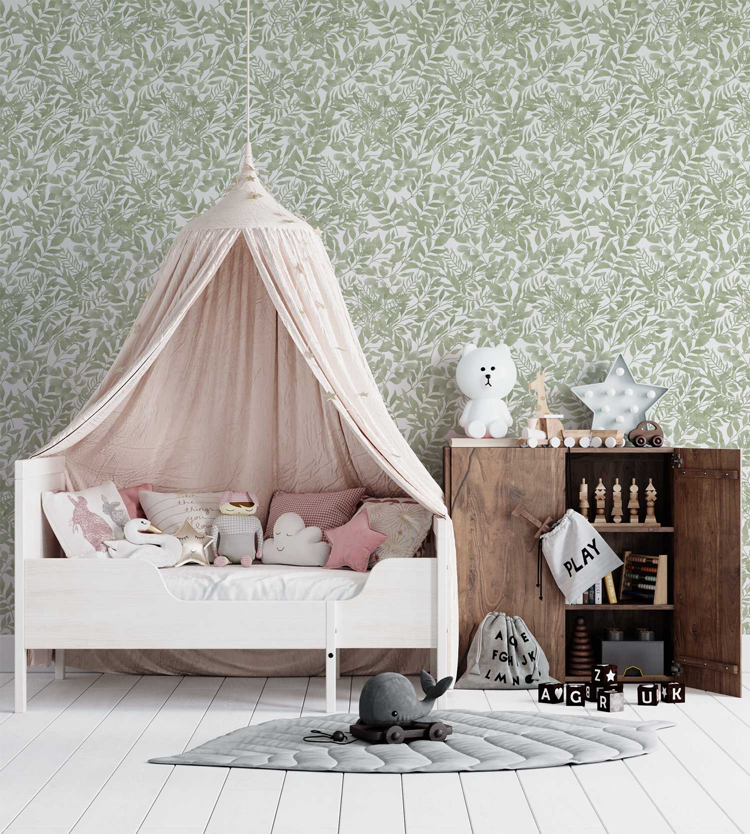 Gentle green watercolor leaf peel and stick wallpaper in a baby nursery