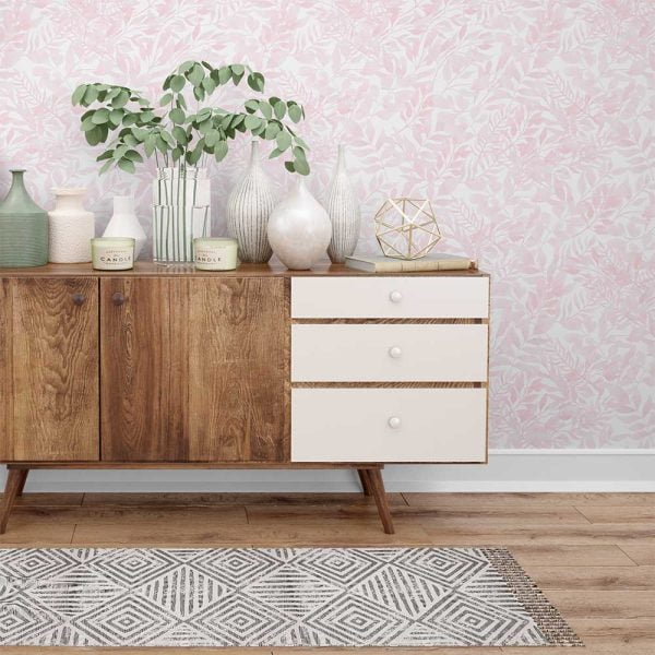 Soft pink watercolor leaves wallpaper in a hallway, creating a serene and elegant atmosphere
