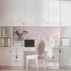 Soft pink watercolor leaves wallpaper in a girl's bedroom, adding a touch of elegance and charm