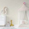 Contemporary beige and white elephant wallpaper in a baby nursery