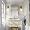 Fun beige and white elephant wallpaper in a kids bathroom