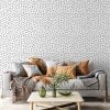 Black and white polka dot contemporary wallpaper in a living room