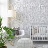 Black and white polka dot contemporary wallpaper in a child's room