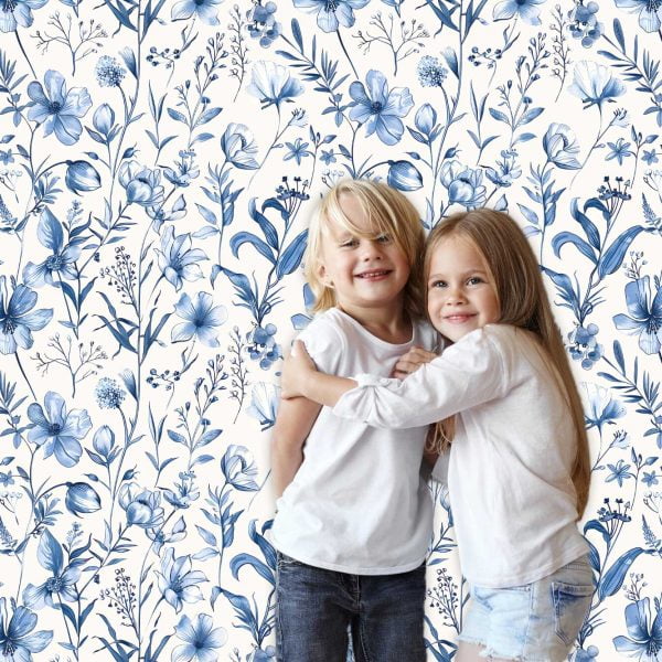 Gentle blue watercolor floral wallpaper in a baby playroom