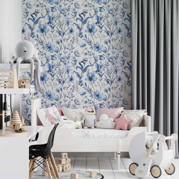 Playful blue watercolor floral wallpaper in a kids' bedroom