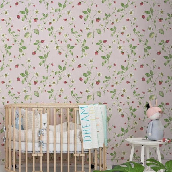 Pink strawberry floral wallpaper in a baby girl's nursery