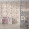 Pink strawberry floral kids wallpaper in a girl's room