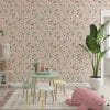 Pink strawberry floral kids wallpaper in a girl's room