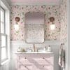Pink strawberry floral wallpaper in a pretty bathroom