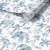 Blue wallpaper for kids featuring cute tropical elephants in a vibrant design.