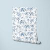 Decorate your little one’s room with Blue Wallpaper for Kids, showcasing cute tropical elephants in blue.
