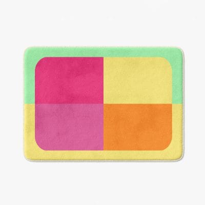 Anti-mold, anti-slip pink and green geometric bath mat for bathroom safety and style