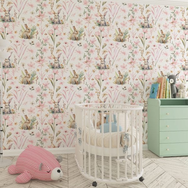 Baby nursery with pink floral bunny wallpaper
