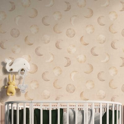 Oatmeal moon wallpaper in gender neutral nursery with soft natural light