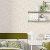 Micro stars wallpaper in toddler room with neutral decor